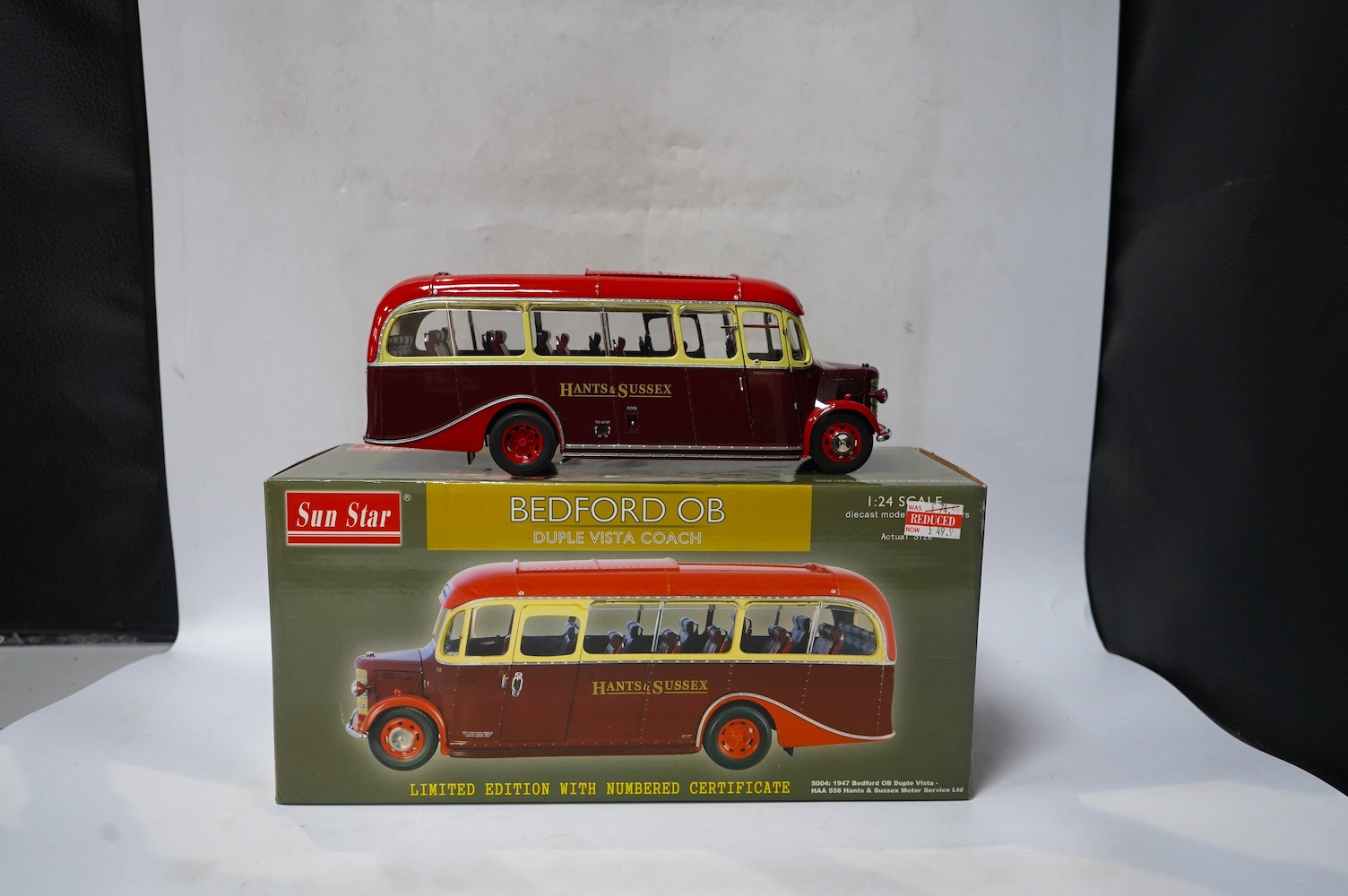 A boxed SunStar 1:24 scale Bedford OB Duple Vista coach, in Hants and Sussex delivery, with separate wing mirror and certificate. Condition - good, the model appears not to have been out on display.